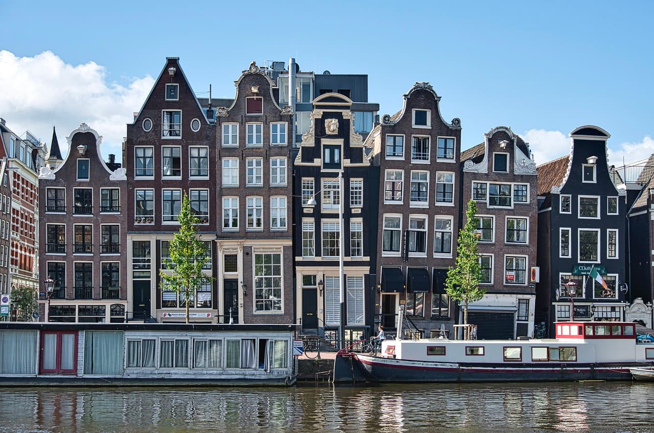 Amsterdam is a wonderful destination for visitors to Europe. (Image by Siggy Nowak from Pixabay)